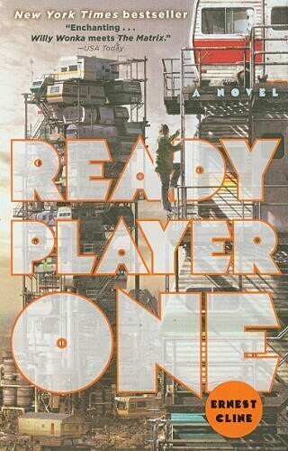 The book cover of "Ready Player One" by Ernest Cline shows a person climbing scaffolding in a futuristic stack of trailers. The title is prominently displayed in large red-orange letters. A quote from USA Today is featured, along with the note that it is a bestseller.
