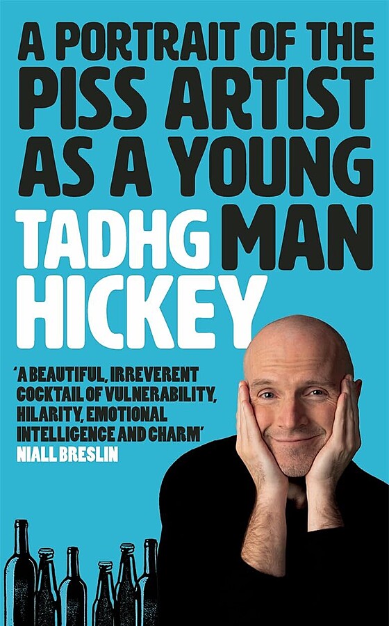 Book cover of "a portrait of the artist as a young man" by tadhg hickey, featuring a bald man with hands pressed to his cheeks, smiling, against a blue background. text includes a quote praising the book.