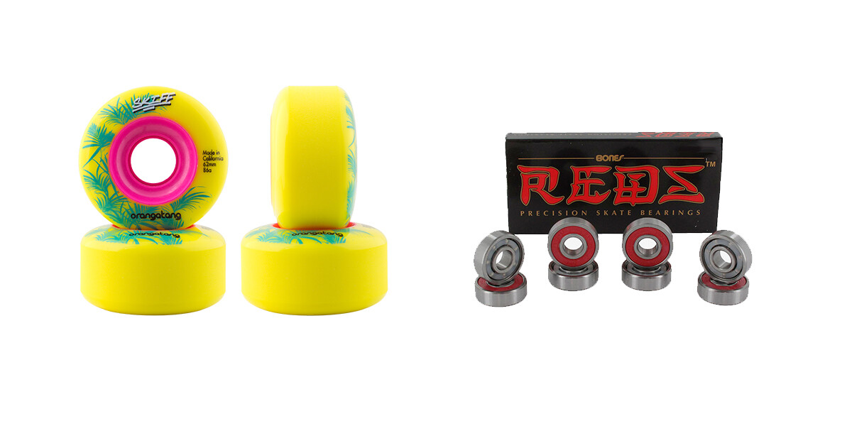 The image shows two yellow skateboard wheels with a design featuring palm trees and the word "orangatang." Next to them is a box labeled "Bones Reds Precision Skate Bearings," with four bearings displayed in front of the box.