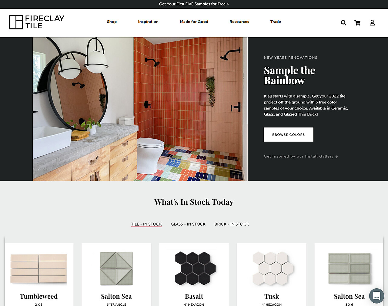 A website page from Fireclay Tile showcasing tile products. The header features a banner highlighting a promotion for free tile samples. Below, a section titled "What's In Stock Today" displays various tile options with images and names including Tumbleweed, Salton Sea, Basalt, and Tusk.