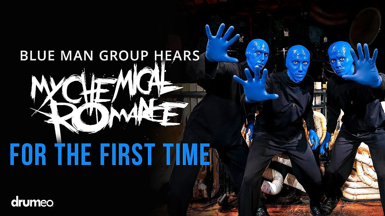 Three performers in black outfits with blue-painted faces are posing dramatically with outstretched hands. Text on the image reads, "Blue Man Group Hears My Chemical Romance For The First Time," followed by the word "drumeo" in the bottom left corner.