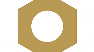 A golden hexagon with a circular cutout in the center is depicted against a white background. The hexagon has six equal sides, and the circular cutout is perfectly centered within the hexagon. The colors are solid and the shapes are geometric.